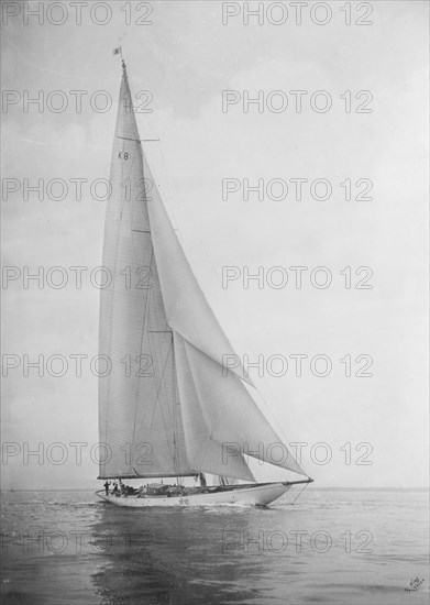 The 23 Metre 'Candida' sailing close-hauled, 1935. Creator: Kirk & Sons of Cowes.