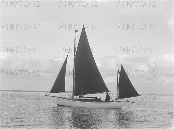 The 4 ton yawl 'Mandy' under sail, 1922. Creator: Kirk & Sons of Cowes.