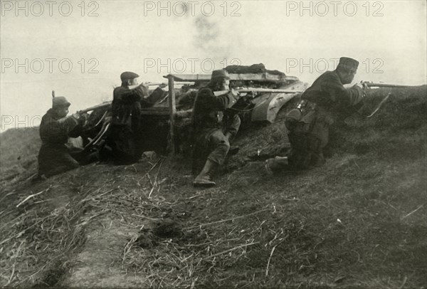 Belgians Holding the River at Termonde', (1919).