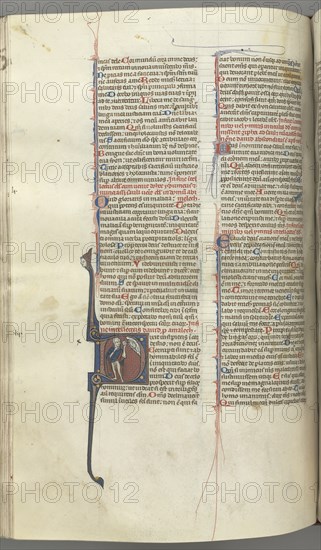 Fol. 222v, Psalm 52, historiated initial D, a fool naked but for a cloak, holding a bladder..., c. 1 Creator: Unknown.