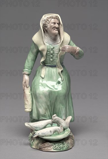 Old Woman Feeding Chickens, c. 1770. Creator: Staffordshire Factory (British).