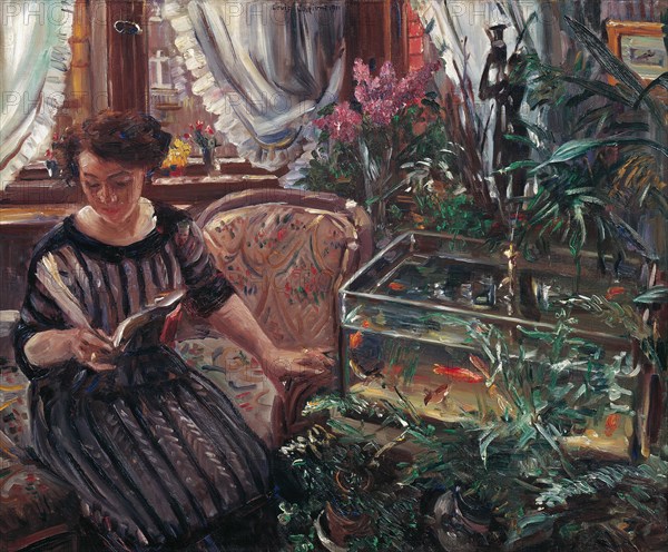 A Woman Reading near a Goldfish Tank, 1911. Creator: Corinth, Lovis