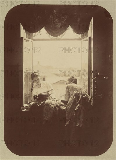 [Two Young Women at Window], ca. 1870.