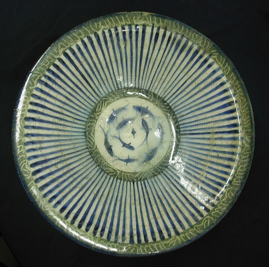 Bowl with Central Fish Motif, Iran, 13th century. Juxtaposition of fish with magical letters suggests the bowl had talismanic properties