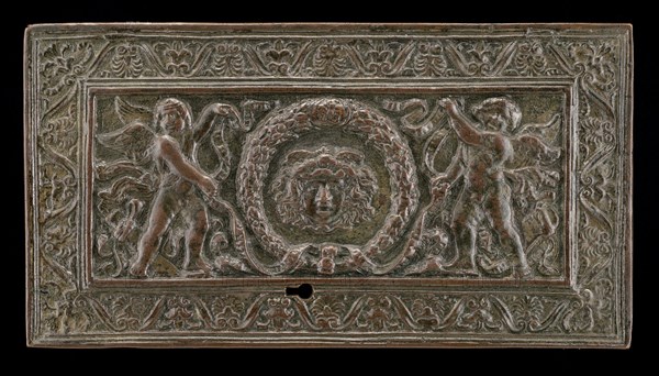 Cover of a writing casket: Geniuses with Wreath and Medusa Head, c. 1500.