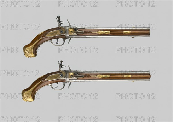 Double-Barrel Revolving Flintlock Holster Pistol (One of a Pair), Liège, 1720/30. Creator: Thomas Thiermay.