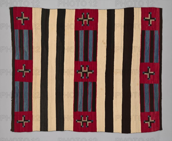 Chief Blanket (Third Phase), c. 1880. A work made of wool, single interlocking and slit tapestry weaves with "lazy lines"; twined warp ends and selvages.