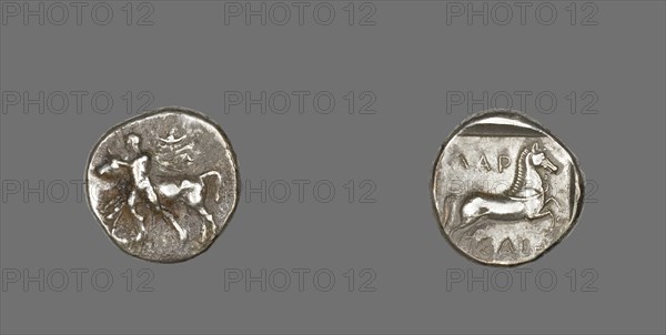 Drachm (Coin) Depicting Thessalos Holding a Bull, 435-400 BCE.