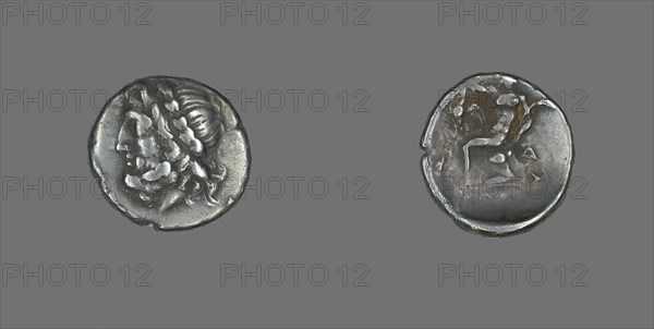 Hemidrachm (Coin) Depicting the God Zeus, late 4th century BCE. Creator: Unknown.