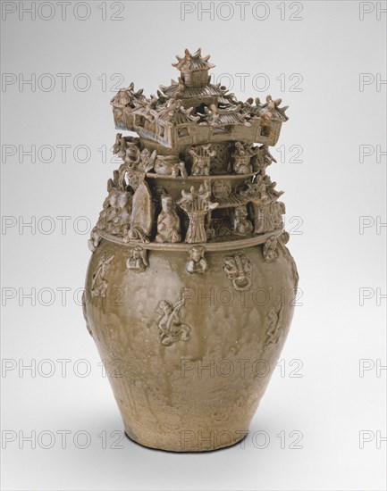 Funerary Urn (Hunping), Western Jin dynasty (A.D. 265-316), late 3rd century. Medium sized olive colored urn, upper half carved into figures and structures.