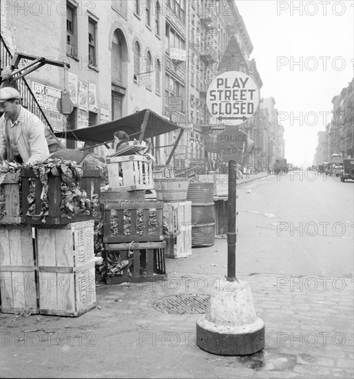 Play street for children, Sixth Street and Avenue C, New York City, 1936. Creator: Dorothea Lange.