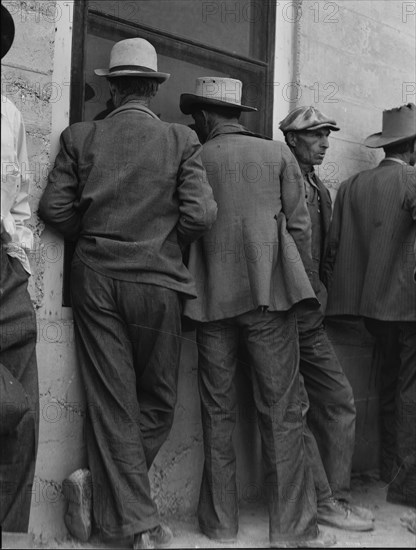 Waiting for the relief checks at Calipatria, California, 1937. Creator: Dorothea Lange.