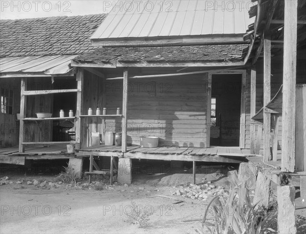 House in which cotton farmer has lived for fifty years, Macon County, Georgia, 1937. Creator: Dorothea Lange.