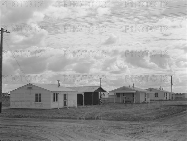 Looking from the camp to adjoining tract, Shafter migrant camp, California, 1938. Creator: Dorothea Lange.