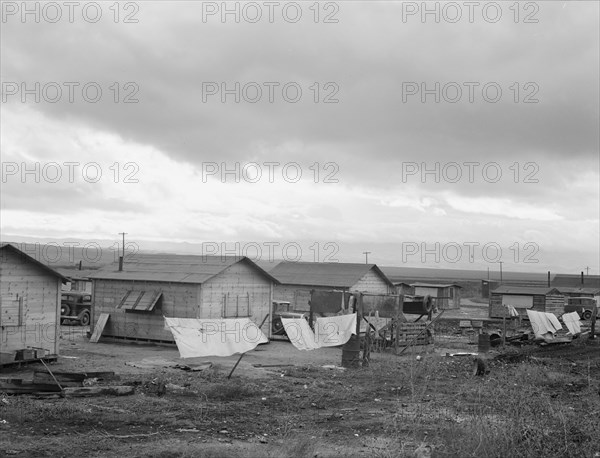 Company cotton pickers' camp after picking season, Buttonwillow, California , 1939. Creator: Dorothea Lange.