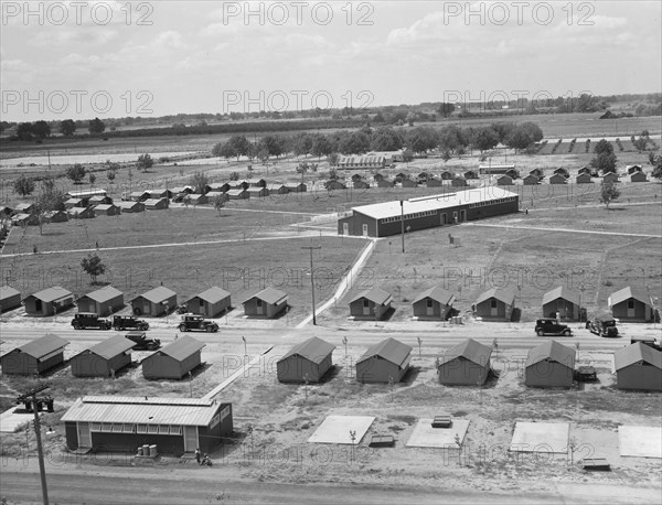 View of FSA camp Farmersville seen from water tower, Tulare County, California, 1939. Creator: Dorothea Lange.