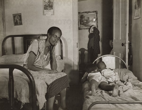 Mrs. Ella Watson, who has been a government charwoman..., Washington, D.C., 1942. Creator: Gordon Parks.