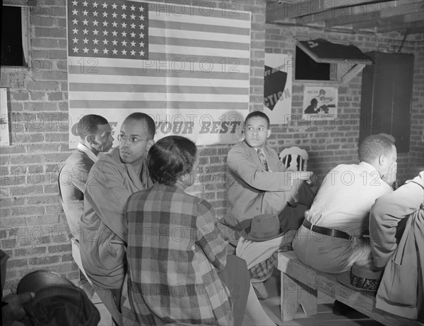 Air raid wardens' meeting in zone nine, Southwest area, Washington, D.C, 1942. Creator: Gordon Parks.