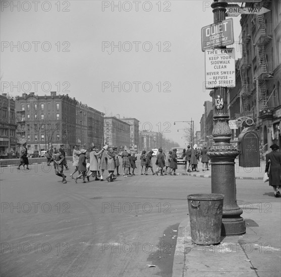 Many accidents are attributed to unpatrolled intersections in Harlem, New York, 1943. Creator: Gordon Parks.