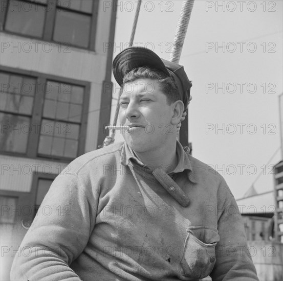 A Fulton fish market stevedore, New York, 1943. Creator: Gordon Parks.