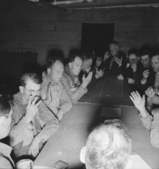 Meeting of the camp council, FSA camp, Farmersville, California, 1939. Creator: Dorothea Lange.