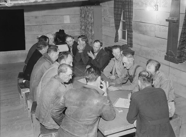 Meeting of the camp council, FSA camp, Farmersville, California, 1939. Creator: Dorothea Lange.