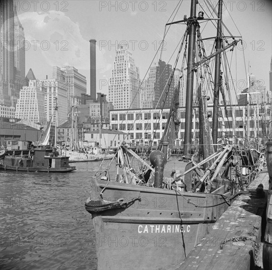 The New England fishing boat, the Catherine C, docked at the Fulton fish market, New York, 1943. Creator: Gordon Parks.