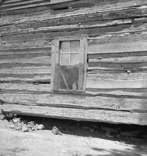 Log house of rural non-farm family. House is over fifty years old. Orange County, North Carolina.