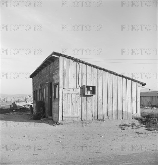 Cabin which rents for ten dollars a month in Arkansawyer's auto camp. Greenfield, California.