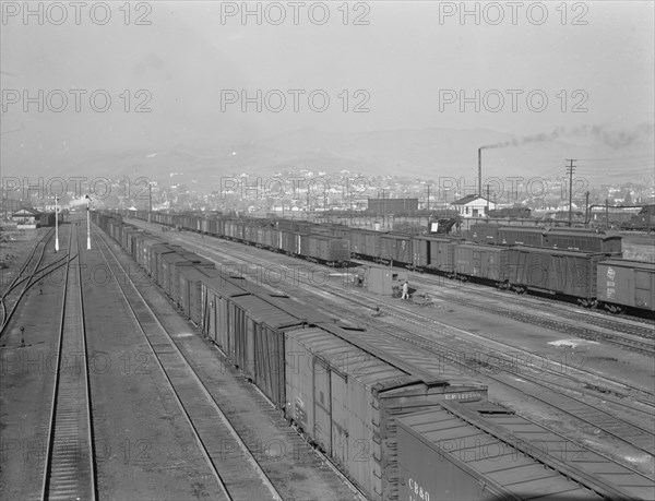 Railroad yard, outskirts of fast-growing town. Klamath Falls, Oregon.