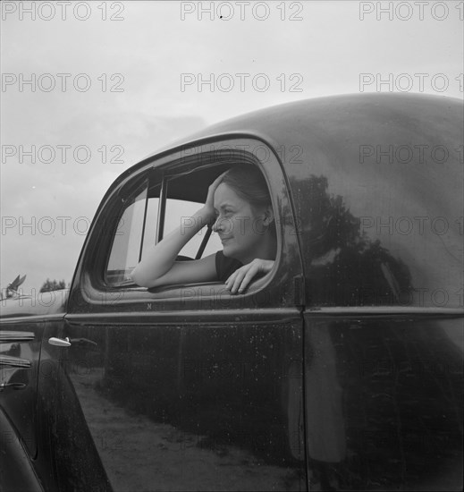 Untitled, 1935-1942. [Woman in a car]. Creator: Unknown.
