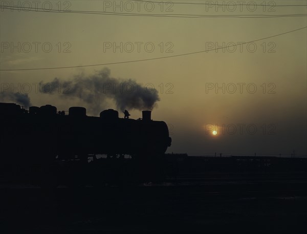 Indiana Harbor Belt RR, switch engine in yard near Calumet park..., near Chicago, Ill., 1943. Creator: Jack Delano.