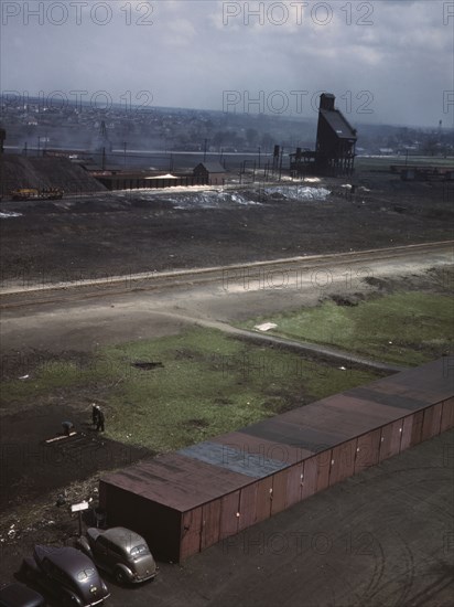 C & NW RR railroad workers cultivating a little Victory garden at Proviso yard, Chicago, Ill., 1943. Creator: Jack Delano.