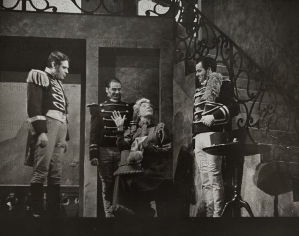 Woman talking to three men, 1938.