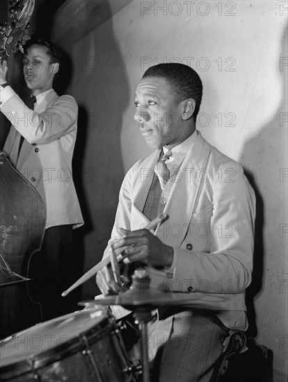 Portrait of Tommy Myles and Tommy Potter, ca. Mar. 1942. Creator: William Paul Gottlieb.