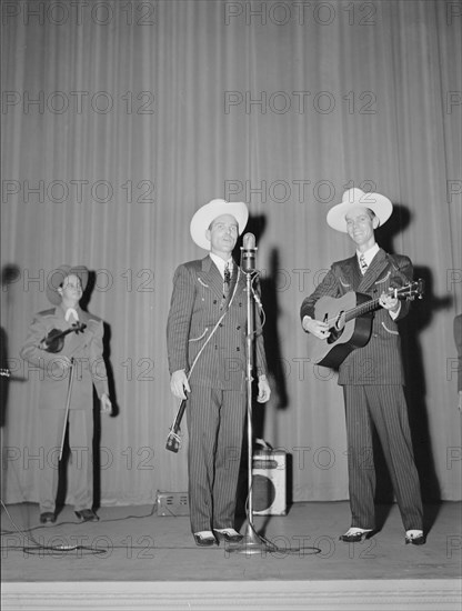 Portrait of Ernest Tubb concert, Carnegie Hall, New York, N.Y., Sept. 18-19, 1947. Creator: William Paul Gottlieb.