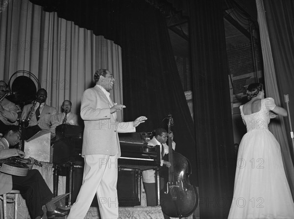 Portrait of Duke Ellington, Barney Bigard, Ben..., Howard Theater(?), Washington, D.C., 1938. Creator: William Paul Gottlieb.