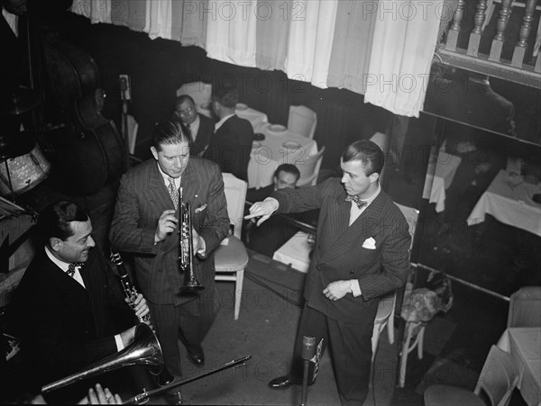 Portrait of Tony Parenti, Wild Bill Davison, and Eddie Condon, Eddie Condon's, N.Y., ca. June 1946. Creator: William Paul Gottlieb.