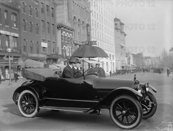 District of Columbia; Traffic - Stop And Go Signs, 1913. Creator: Harris & Ewing.