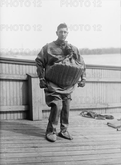 Life Saving Suit Worn By T. Aud, 1916. Creator: Harris & Ewing.