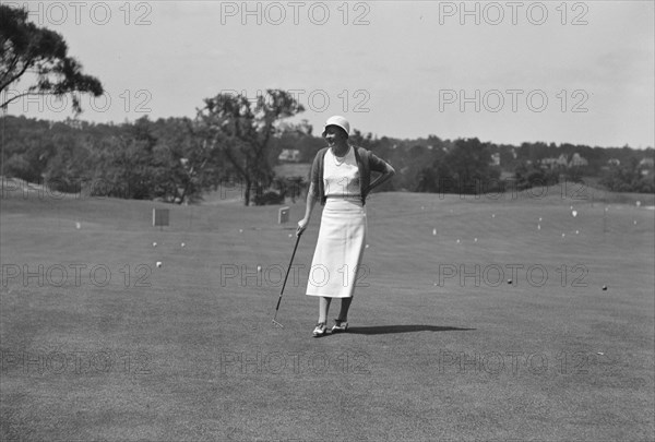 Cassidy, Ellen, Mrs., on golfcourse, 1932 July. Creator: Arnold Genthe.