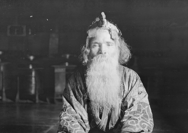 Ainu chief wearing a headdress, 1908. Creator: Arnold Genthe.