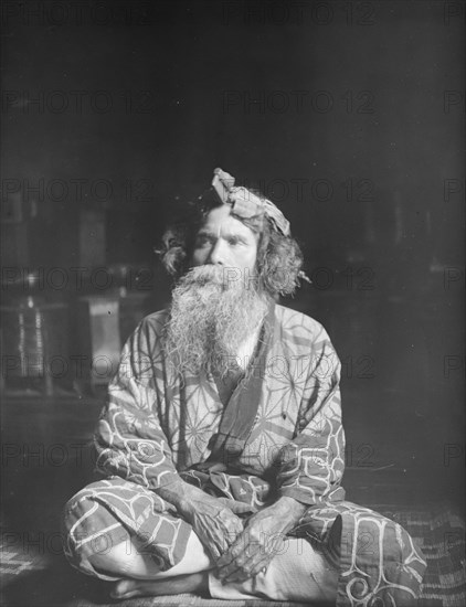 Ainu chief wearing a headdress, 1908. Creator: Arnold Genthe.