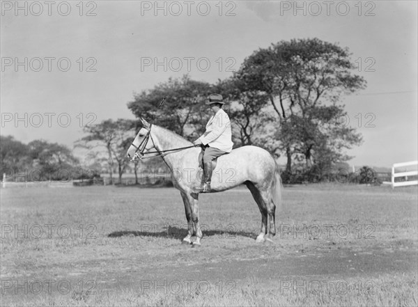 Fletcher, Walter D., on horse, 1933 or 1934. Creator: Arnold Genthe.