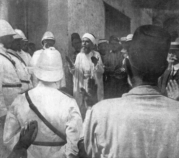 'Le drapeau Francais sur la cote Syrienne; Le cheik de Rouad, invoquant Allah..., 1915 (1924). Creator: Unknown.