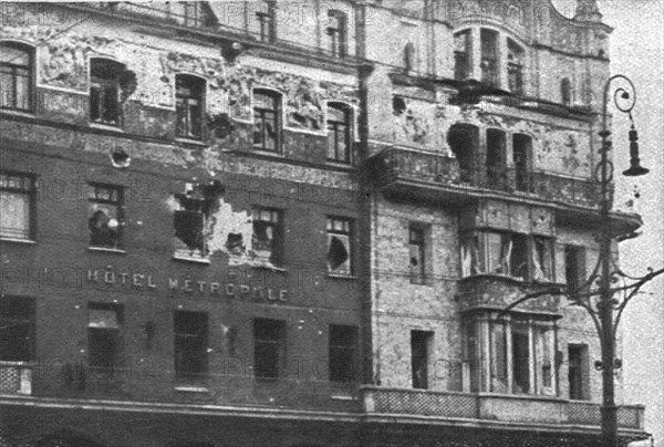 In Soviet Russia; Facade of the Hotel Metropole, in Moscow, cannoned and rifled...1917. Creator: Unknown.