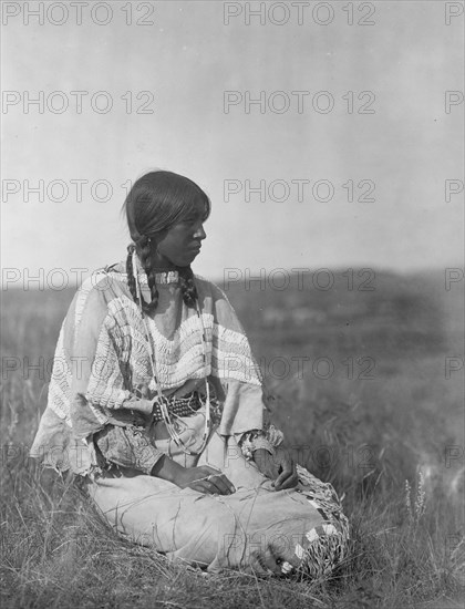 Flint Smoker's daughter, c1910. Creator: Edward Sheriff Curtis.