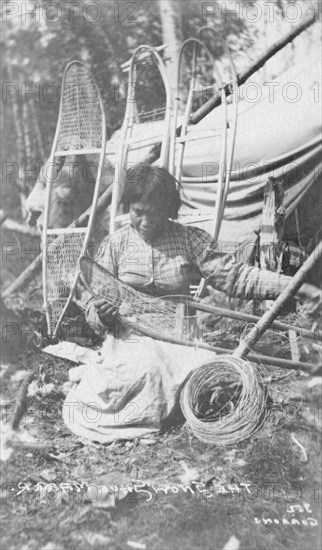Woman making snow shoes, between c1900 and c1930. Creator: Unknown.