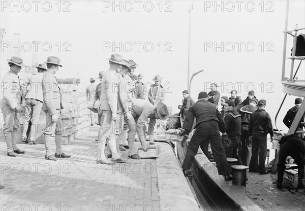 Loading MEADE, 1913. Creator: Bain News Service.