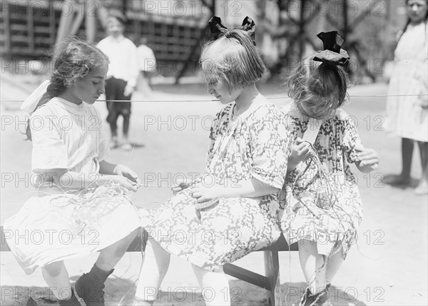 N.Y. Playground [raffia work], between c1910 and c1915. Creator: Bain News Service.